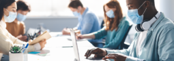 masked people doing effective group work