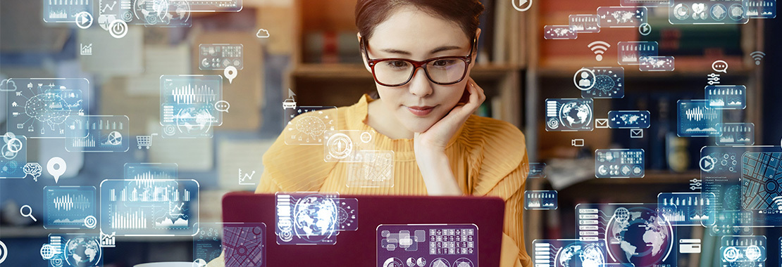 Image of a woman using a laptop.