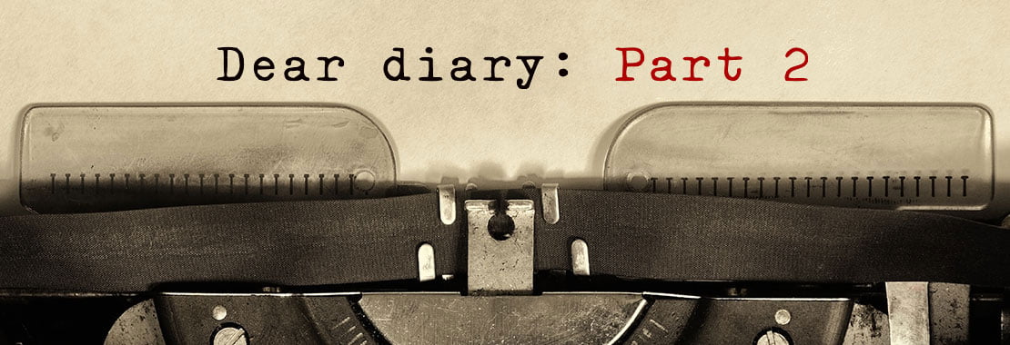 close-up of typewriter with "dear diary: part 2" typed out on paper