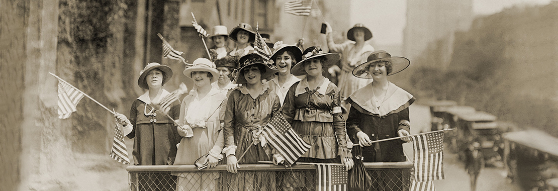 historic photo of women with American flags