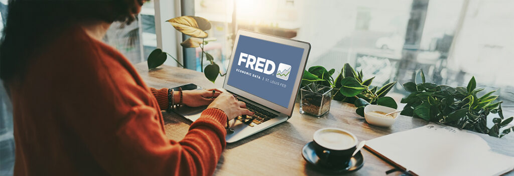 An individual viewing FRED database.