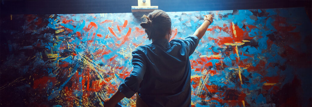An artist paints.